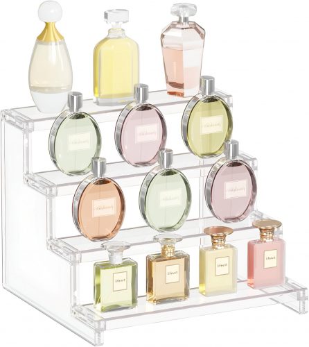 Acrylic shelf displaying perfume bottles, a stylish setup for 7-tier shelves in a vanity area.