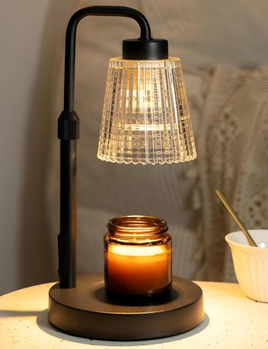 Black arched GODONLIF candle warmer lamp with lit candle - stylish Amazon decor finds under $50 for any room.