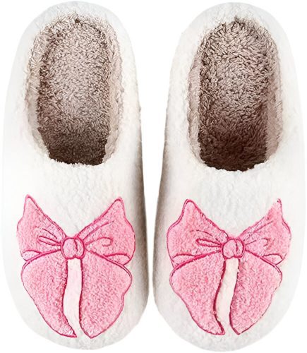 Cozy white slippers with pink bows, a charming addition to 7-tier shelves in a bedroom.