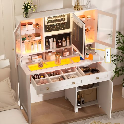 Luxurious white makeup vanity with illuminated cabinets, jewelry storage, and drawers, showcasing a 2025 Amazon glam vanity setup with organized beauty products and decor.