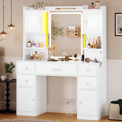 Sleek white makeup vanity with gold legs, LED mirror, and glass shelves, displaying beauty products in a chic 2025 Amazon glam vanity setup.
